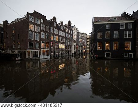Typical Amsterdam Architecture Style Buildings Houses Grachten Canal At Oudezijds Voorburgwal Hollan