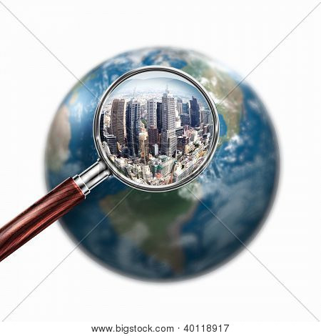 planeta mini conceptual con una ciudad en él