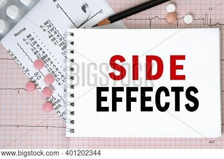 Notebook Page With Words - Side Effects Nearby With A Pills And Pencil, Medical Concept, Top View
