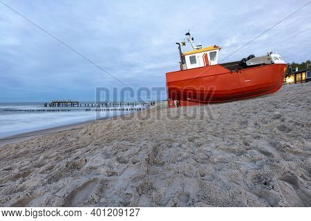 Uniescie, West Pomeranian Voivodeship Poland - December, 26, 2020: Fishing Boats On The Seashore. A