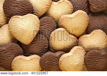 Heart Shaped Cookies Background. Baked Butter And Chocolate Cookies Texture Background. Valentine's 