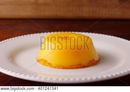 Quindim Is A Sweet That Has As Ingredients Egg Yolk, Sugar And Grated Coconut, Very Traditional In B