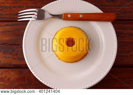 Quindim Is A Sweet That Has As Ingredients Egg Yolk, Sugar And Grated Coconut, Very Traditional In B