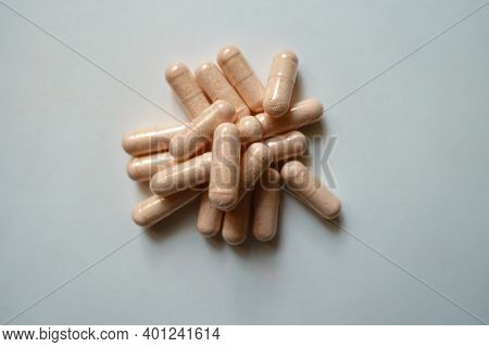 View Of Heap Of Pink Capsules Probiotic Dietary Supplements From Above