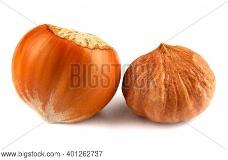 Inshell And Peeled Forest Nuts Are Isolated On A White Background. Hazelnut Is Isolated On A White B