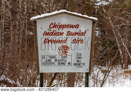 Superior, Wi, Usa  -  December 27, 2020: Chippewa Indian Burial Ground Site Marker Sign On Wisconsin