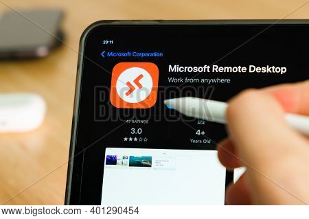 Microsoft Remote Desktop Logo Shown By Apple Pencil On The Ipad Pro Tablet Screen. Man Using Applica