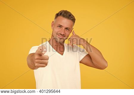 Call Me Right Now. Happy Man Show Call Me Gesture Pointing Finger. Call Centre Service. Sales Call. 
