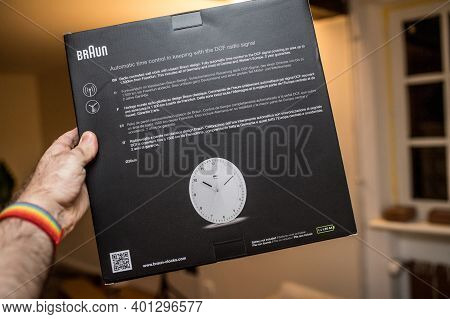Paris, France - Dec 8, 2020: Pov Personal Perspective Male Hand Holding Package Of New Braun Bc17f-d