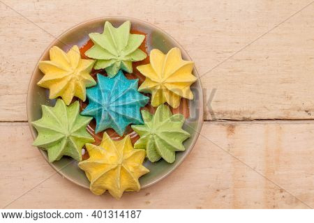 Sweet, Crispy, Multi-colored Meringue In A Plate.