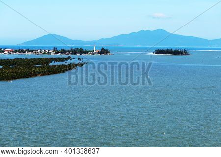 Hoi An, Vietnam, December 29, 2020: Hai Dang Lighthouse At The Mouth Of The Thu Bon River In Hoi An,