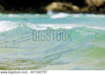 Powerful, Stormy, Foamy Waves Are Picked Up By The Wind. White Foam From Bubbles Of Different Sizes 