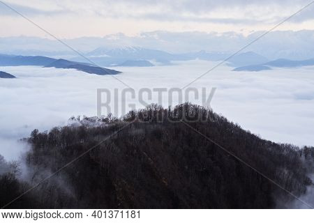 Low Clouds, View Of Winter Forest And Mountains From Observation Deck, Horizontal Picture Of Amazing