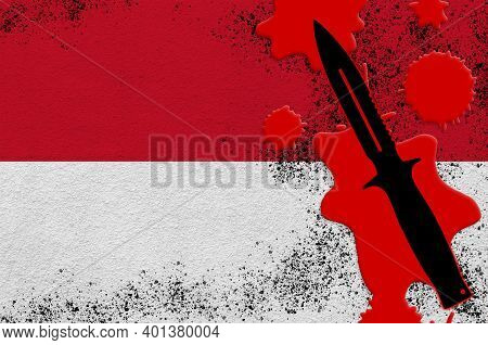 Indonesia Flag And Black Tactical Knife In Red Blood. Concept For Terror Attack Or Military Operatio