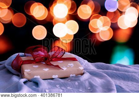Little Gift Box With Red Bow And Hearts