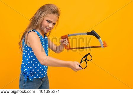 Portrait Of Young Caucaian Girl With Long Fair Hair Hates Her Glasses.