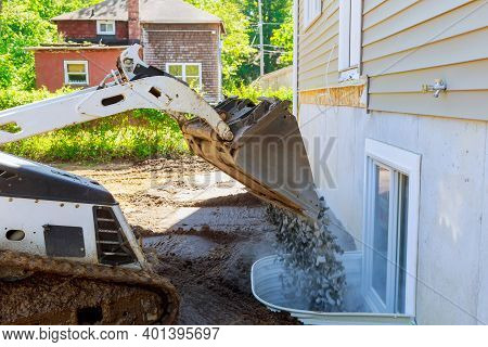 Moving Gravel Scoop Building Materials Window Well For Basement Construction New Residential Home