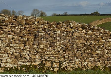 Dry Stone Walls Marking Field Boundaries In The Woolley Valley, An Area Of Outstanding Natural Beaut
