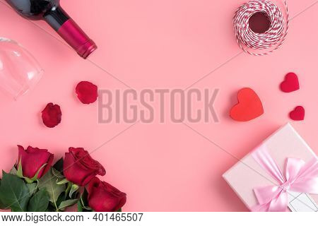 Valentine's Day Dating Gift With Wine And Rose Concept On Pink Background