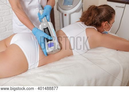 Female Client Relaxing At Beauty Clinic, Getting Endospheres Massage
