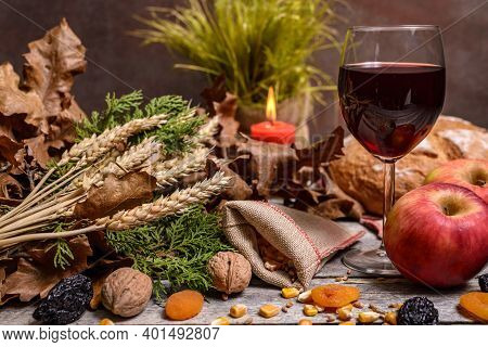 Traditional Food For Orthodox Christmas Eve. Yule Log Or Badnjak, Wine, Bread, Apples, Cereals, Drie