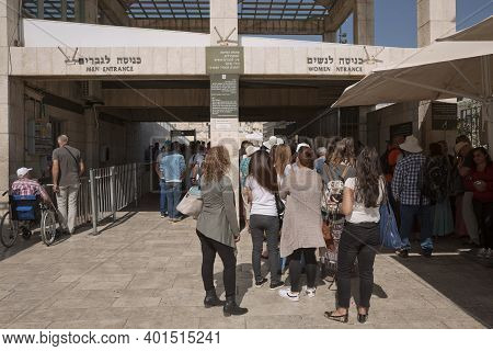 People Entering The Western 'wailing' Wall Of Ancient Temple In Jerusalem. The Wall Is The Most Sacr