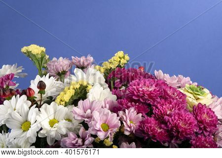 Clorfull Mix Flowers Bouquet Studio Shot On Blue Background