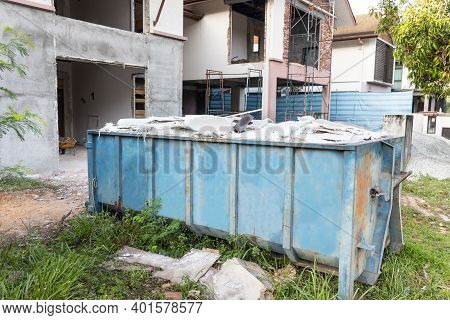 Garbage Roro Dumpter Bin Collects Rubbish At Construction Site