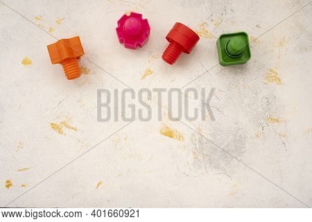 Educational Constructor For Children, Nuts And Bolts In The Form Of Geometric Shapes. Mock Up Backgr
