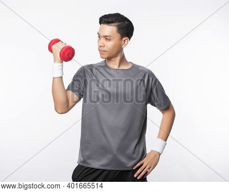 Young Handsome Asian Man In Sport Outfits Exercising With Dumbbell Isolated On White Background.