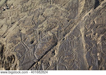 Tomskaya Pisanitsa Museum-reserve, Russia --31 January 2015: Ancient Drawings On The Rocky Bank Of T