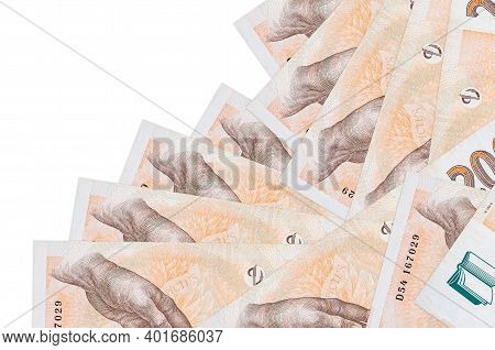 200 Czech Korun Bills Lies In Different Order Isolated On White. Local Banking Or Money Making Conce