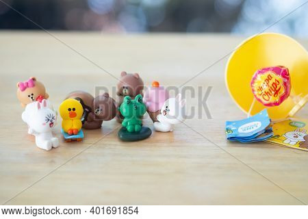 Samut Prakan, Thailand - January 3, 2021 : Line Friend Figure Toy Inside Chupa Chups Lollipop On Woo