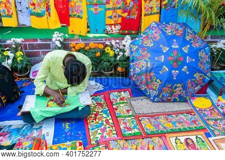 Kolkata, West Bengal, India - 31st December 2018 : Young Bengali Artist Painting Pattachitra Or Pata