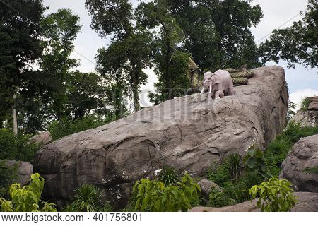 Elephant And Naga Big Snake On Cliff Stone In Wat Tham Klong Phen Forest Temple For Thai People And 