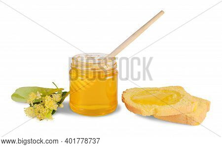 Jar Of Linden Honey With Wooden Dipper, Slices Of Corn Bread And Linden Flowers Isolated On White Ba