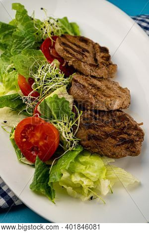 Meat With Vegetables. Pork Medallions. Grilled Meat. Cutlets Close-up. Beef.