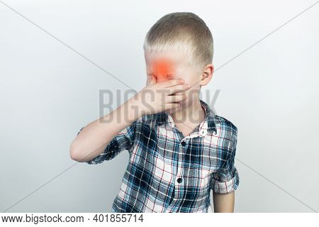 An Ophthalmologist Examines A Boy Who Complains Of Burning And Pain In His Eyes. Eye Fatigue From A