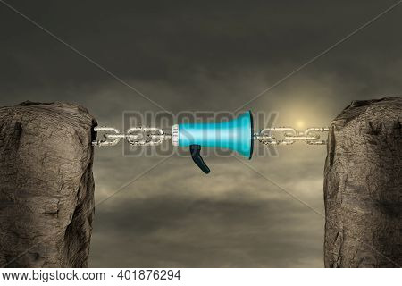 Two Mountains Connected With A Chain By Loudspeaker In Sunset Day. Participation In Your Campaigns O