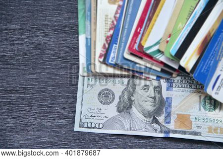One Hundred Dollar Bill With Credit Cards. Cash And Non-cash Money. U.s. Dollars. One Hundred Dollar