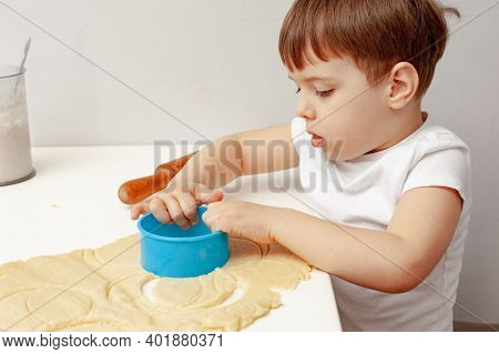 Little Boy Helps Mother To Cook  Making Homemade Coockies. Casual Lifestyle In Home Interior, Pretty