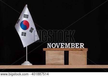 Wooden Calendar Of Novrmber With South Korea Flag On Black Background. Holidays Of South Korea In No