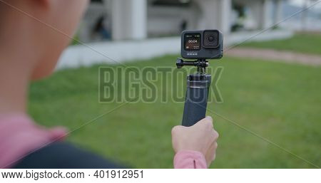 Hong Kong 22 September 2020: Gopro camera, woman take vlog