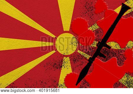 Macedonia Flag And Black Rpg-7 Rocket-propelled Grenade Launcher In Red Blood. Concept For Terror At