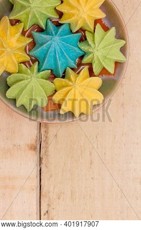 Sweet, Crispy, Multi-colored Meringue In A Plate.