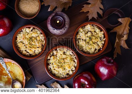 Small apple crambles or apple pies for autumn and winter  