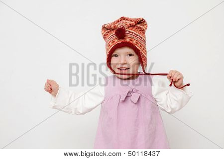 Little Girl Wearing A Hat
