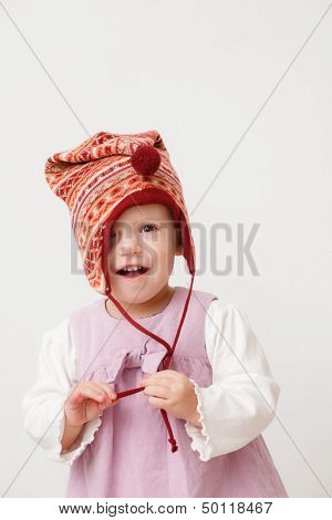 Little Girl Wearing A Hat