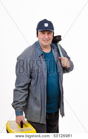 Smiling plumber with tools