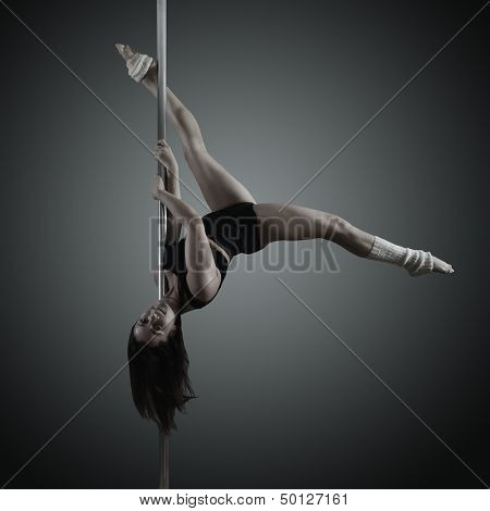 pole dancer, young woman dancing on pylon, toned and noise added